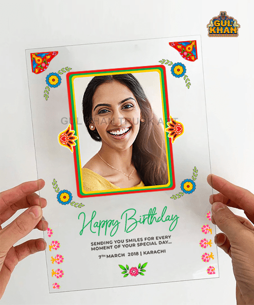 Personalized transparent birthday card with smiling woman photo, floral artwork, and Karachi date