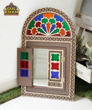Decorative wooden mirror with colorful stained glass panels and intricate carved patterns, showcased indoors